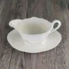 1740415054010 Wedgwood Queens Shape Saus- / Juskom met vaste Schotel