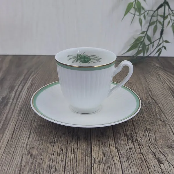 Royal Copenhagen Grøn Melodi 14087 Espresso- Koffiekop met Schotel 1 Royal Copenhagen Grøn Melodi 14087 Espresso- Koffiekop met Schotel 1